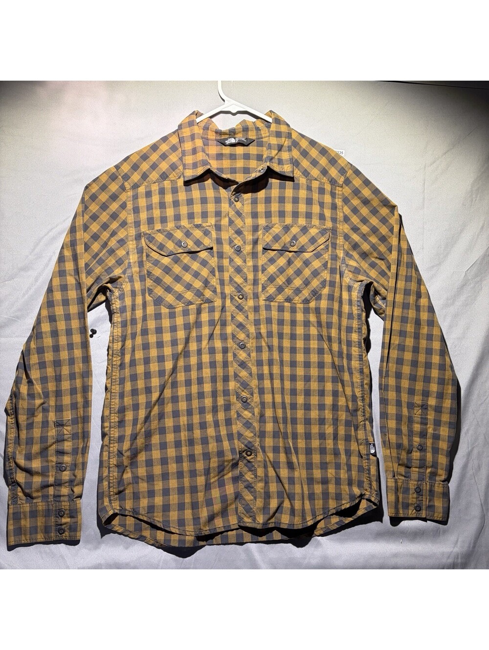 The north face men’s small button up shirt Orange plaid long sleeve collared